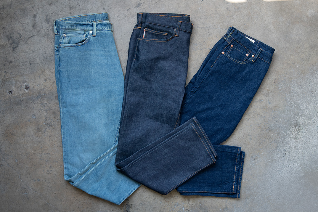 Different types of men’s denim jeans showing fabric and wash variations for manufacturing cost comparison in 2025